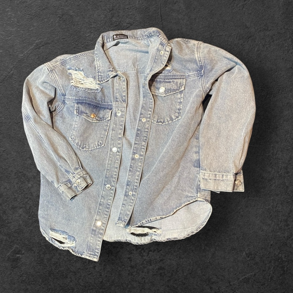 The tin cactus denim ripped jacket .